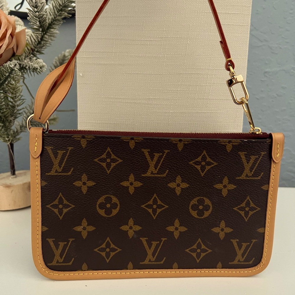 Louis Vuitton zipper pouch.  New.